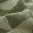 Decke Farum in Grün & Creme aus 100% Merinowolle | Entdecken Sie unsere schönsten Wohnaccessoires