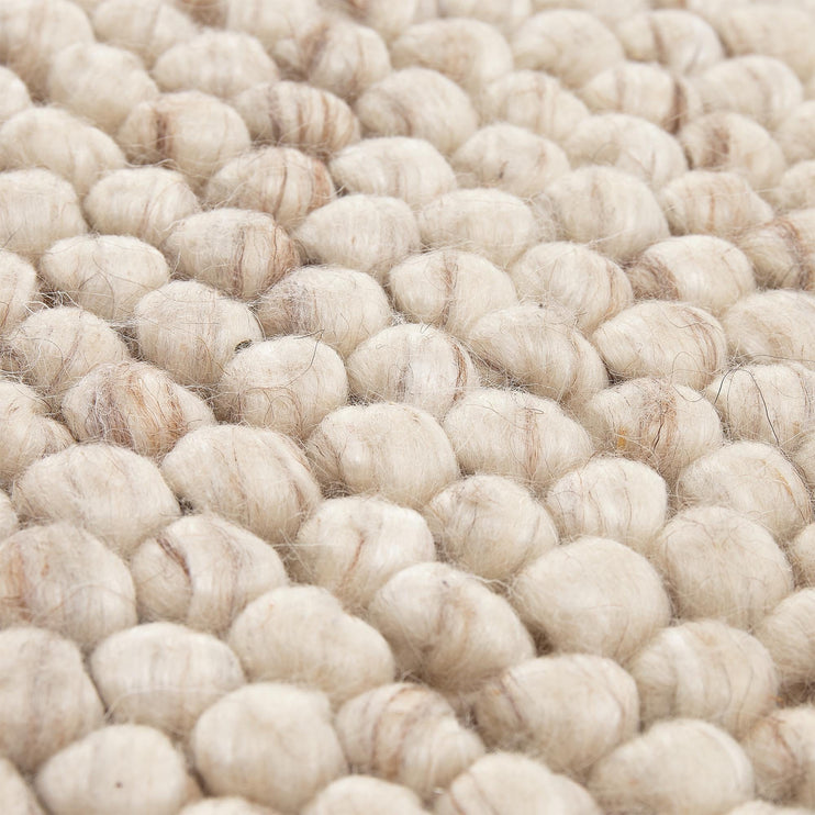 Ravi pouf in natural white, 70% new wool & 30% viscose |Find the perfect stools & poufs